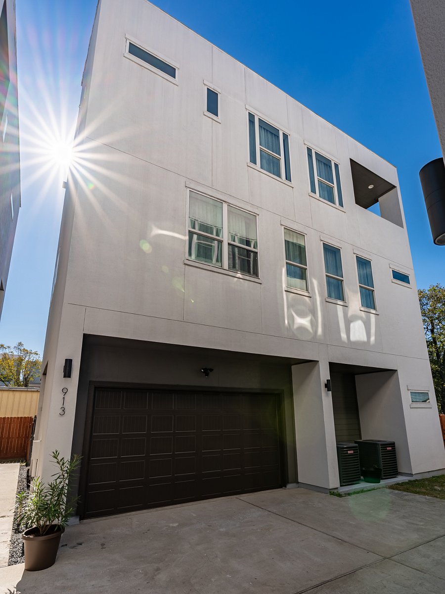  A modern house with a spacious garage.