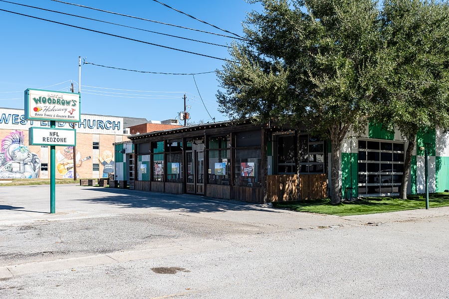 Savor delicious food and drinks at Woodrow's. It's a short (0.5 miles) from the house
