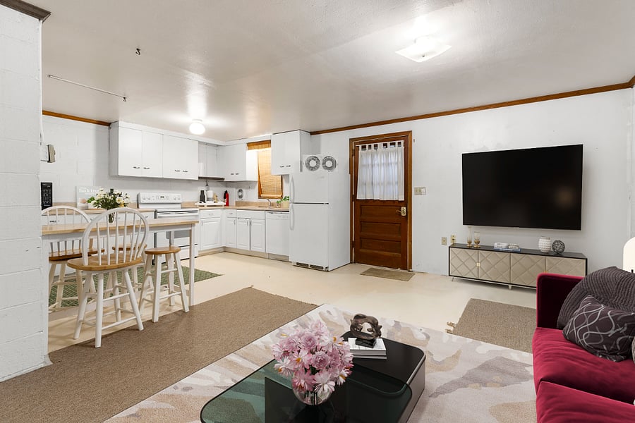 LIVING ROOM AND KITCHEN SPACE.