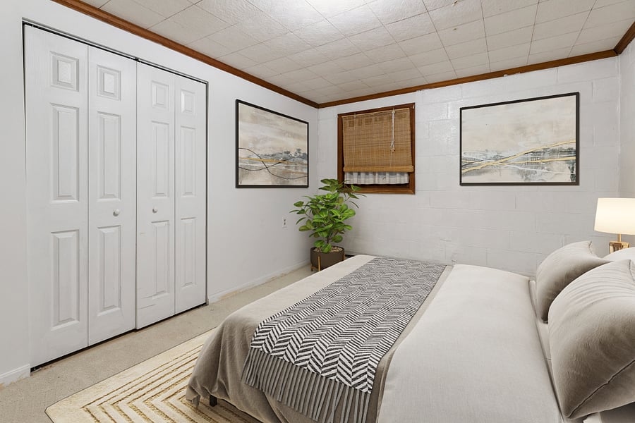 LARGE BEDROOM 1 WITH DOUBLE DOOR CLOSET SPACE.