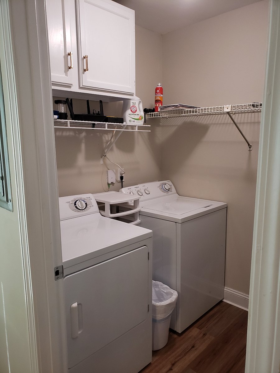 Laundry room off kitchen. New washer and dryer.