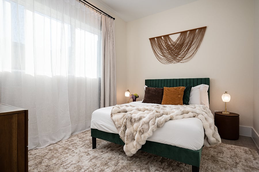 1st floor bedroom with queen bed, comfortable mattress, combo of regular and cooling pillows, soft luxury linens and chic design 