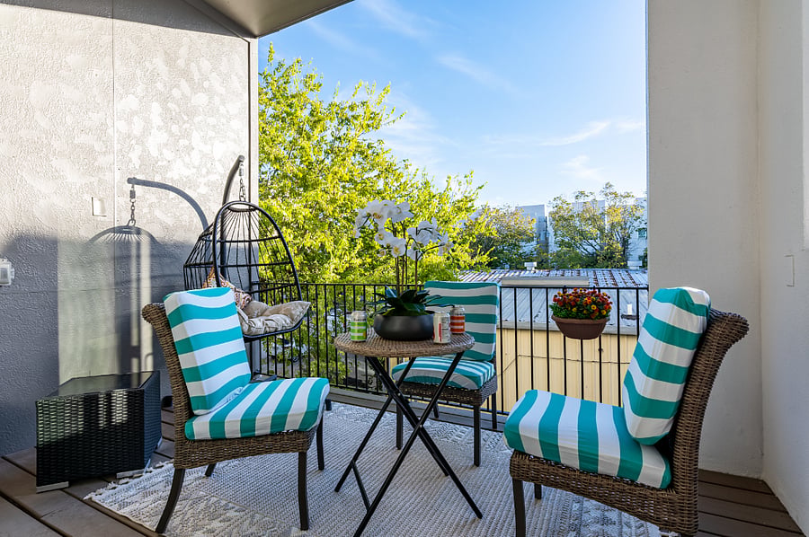 This balcony is perfect for enjoying a cup of coffee in the morning.