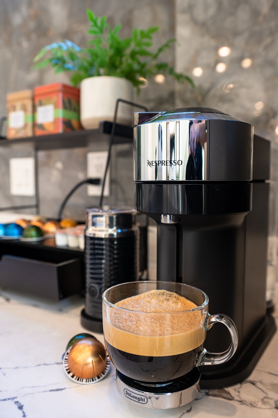 A Nespresso Virtuo coffee machine.