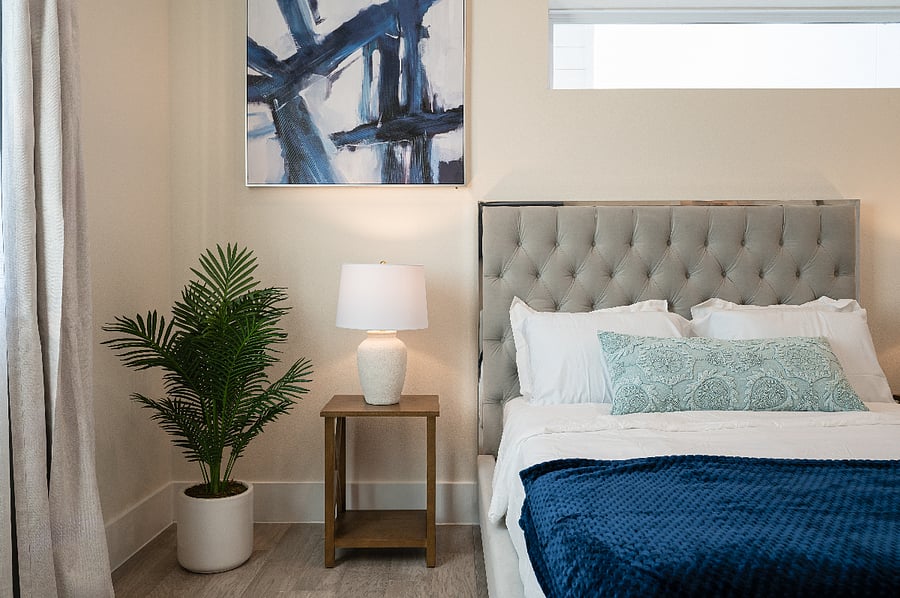 Wake up feeling refreshed in this bright and airy bedroom with a comfortable seating area.
