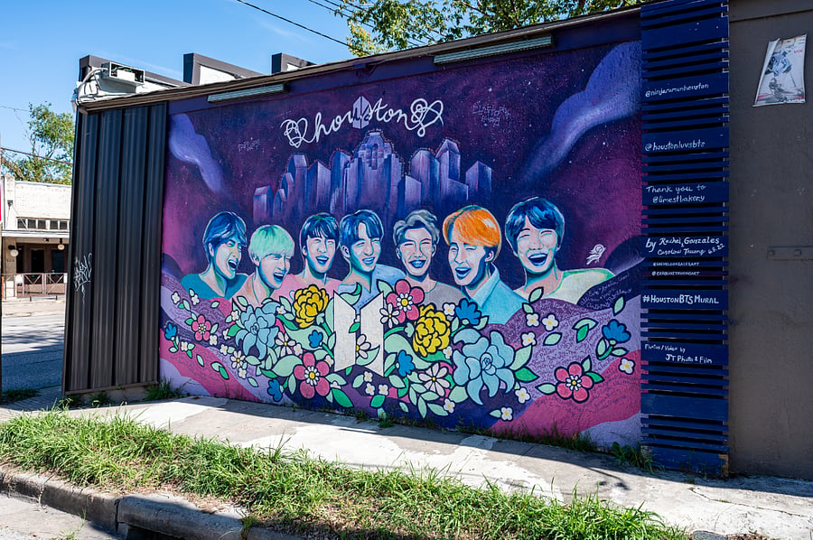 Spot this vibrant BTS mural right outside of your front door! 