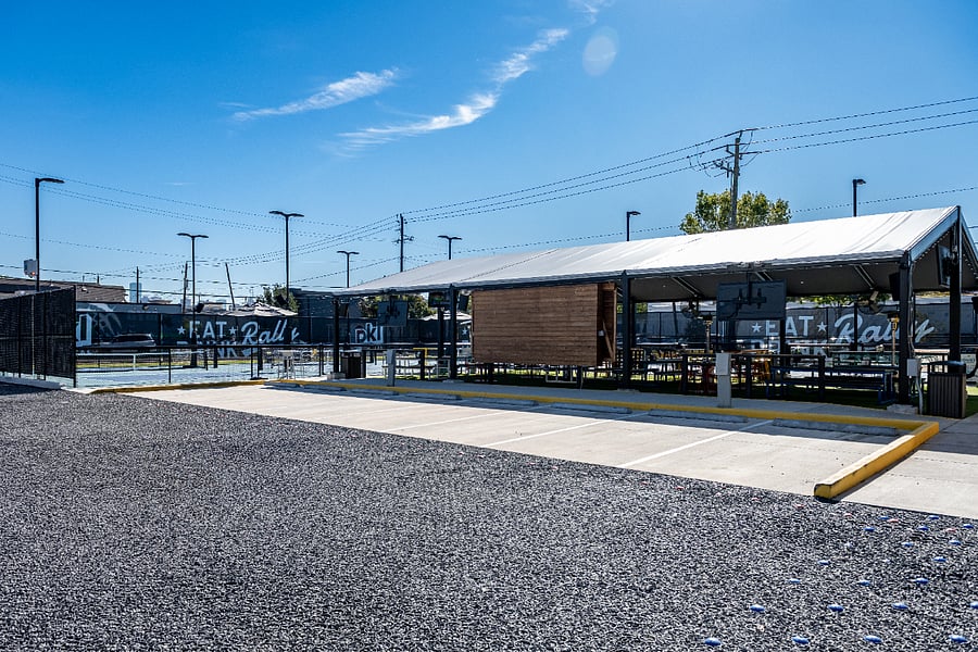 Enjoy a casual meal outdoors at Eat.Rall's. It's a quick (0.5 miles) from the house