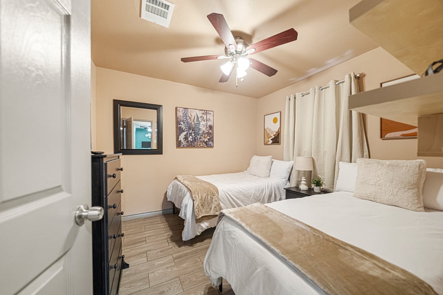 Bedroom with 2 twin beds that can be moved together if needed.