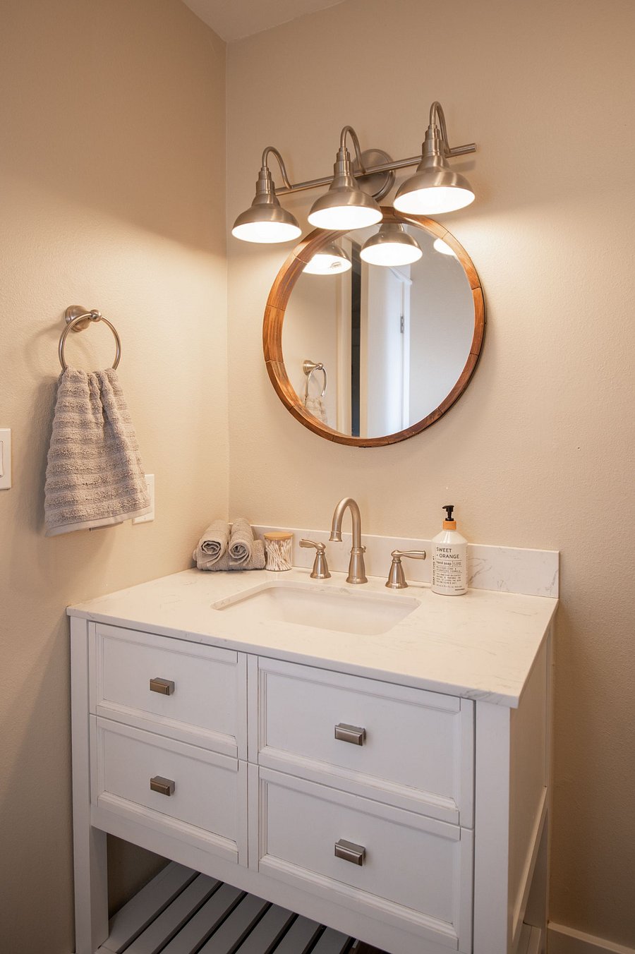 Bathroom near king bedroom with shower