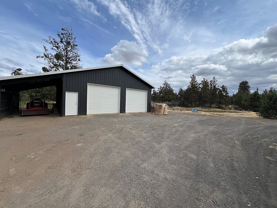 One of our outbuildings and pond area