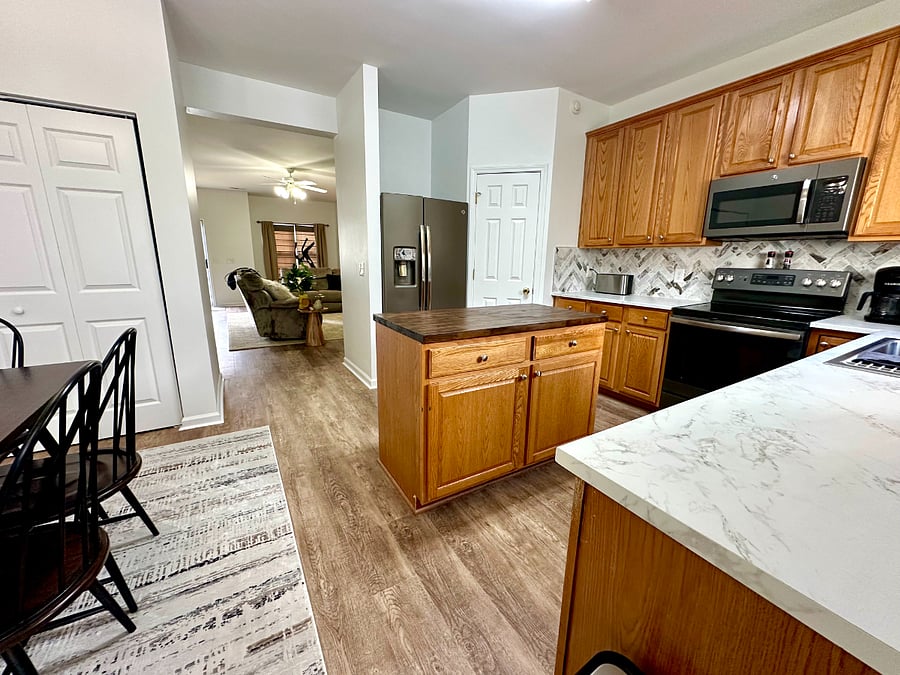 Tons and tons of storage in this kitchen with all the cabinetry and walk-in pantry. We ensure you have EVERYTHING you could need to make gourmet meals. 