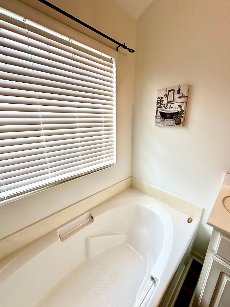 Primary bath features an inviting soaking tub to enjoy after those long days at work. 