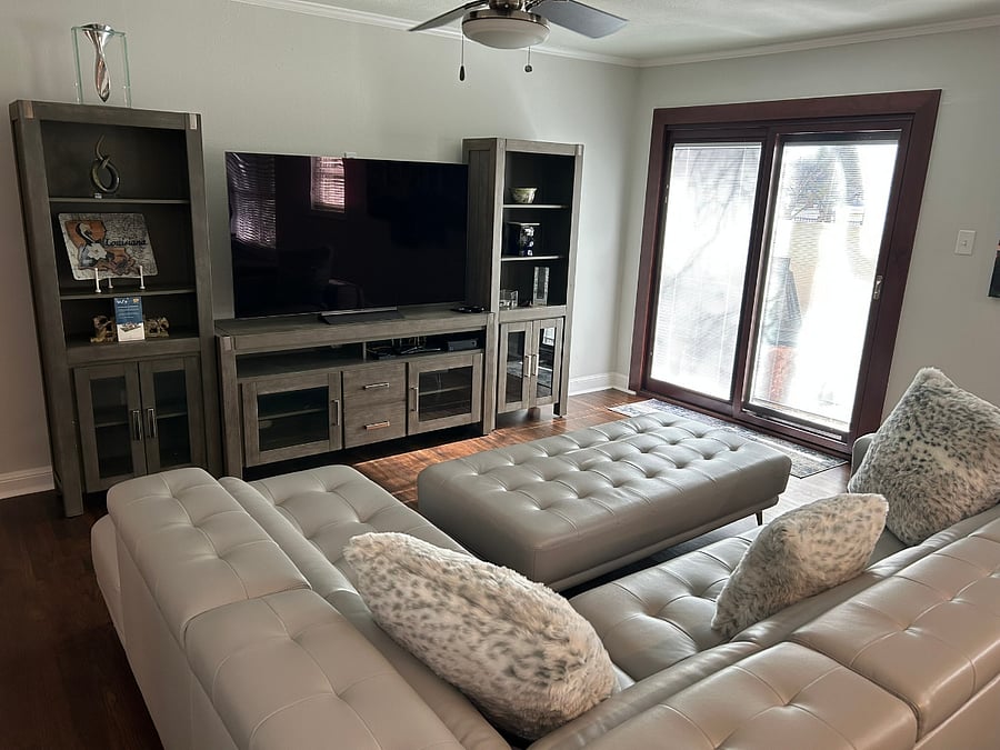 Living room with view of sliding patio/courtyard door