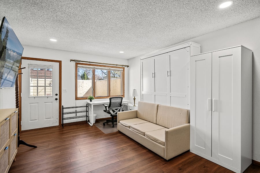 When the Murphy bed is lifted up, the mattress is completely hidden, revealing a comfortable couch and freeing up additional square footage.