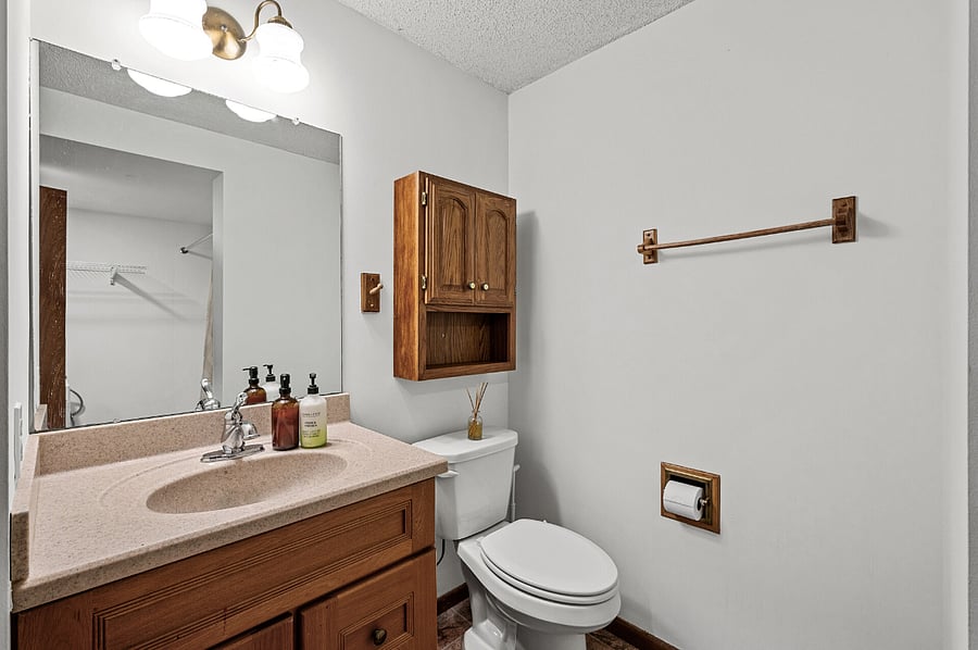 The bathroom offers plenty of additional storage space, allowing you to keep toiletries, towels, and other essentials neatly organized and easily accessible.