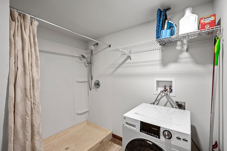 The 2-in-1 washer and dryer takes care of everything in one cycle, so you wont need to remember to transfer your wet clothes to the dryer. An iron, ironing board, and foldable dual-compartment hamper are available to elevate your laundry experience.