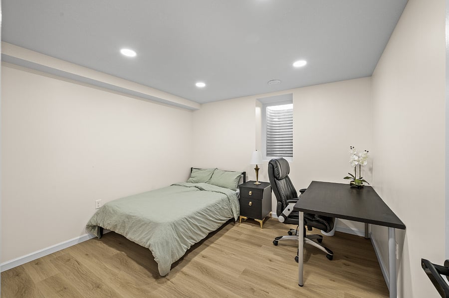 Downstair Bedroom #3: smart door lock, ergonomic office chair, full bed, west-facing window