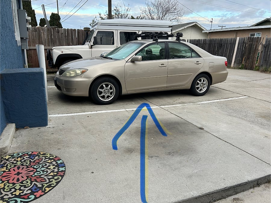 Middle parking space steps from your front door.