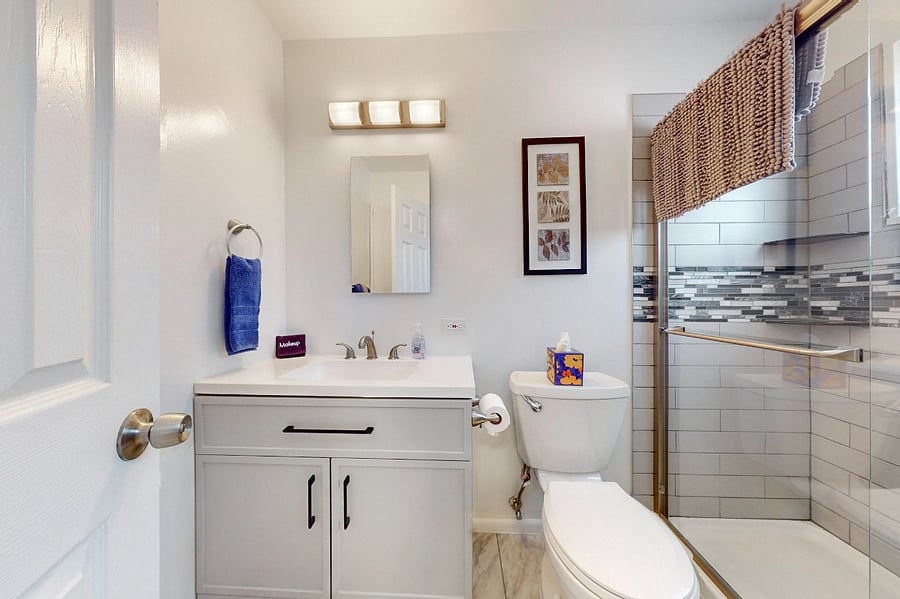 Remodeled bathroom with large walk-in shower