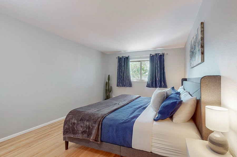 Large bedroom with king-sized bed, dresser, large closet (dresser not shown in photo)