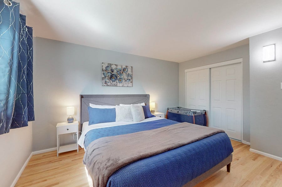 Large bedroom with king-sized bed, dresser, large closet. Pack-n-play available on request.