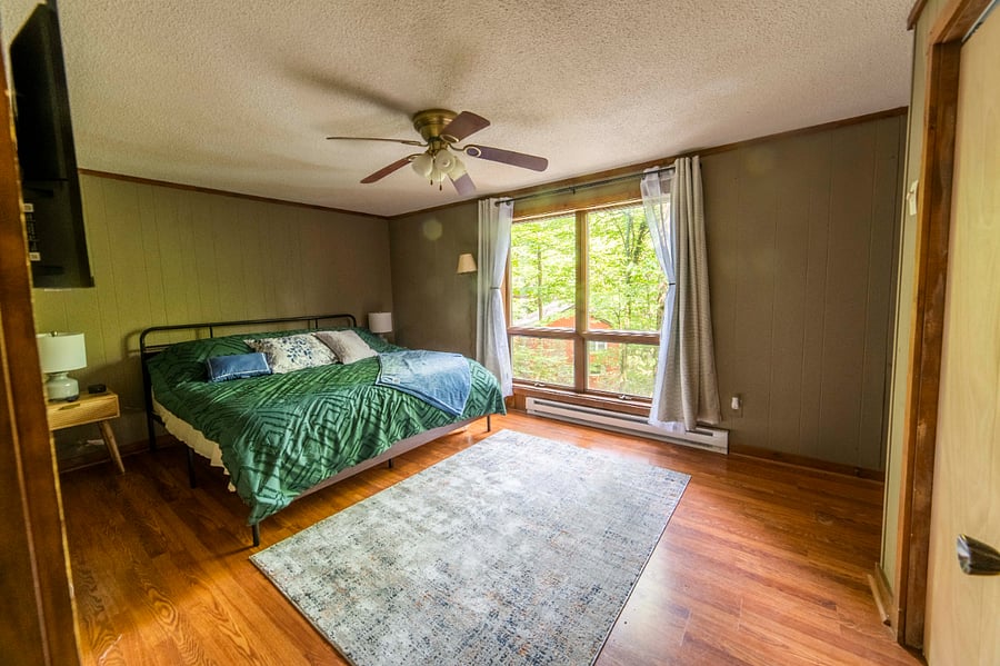 Downstairs bedroom with King Bed and on suite full bathroom 