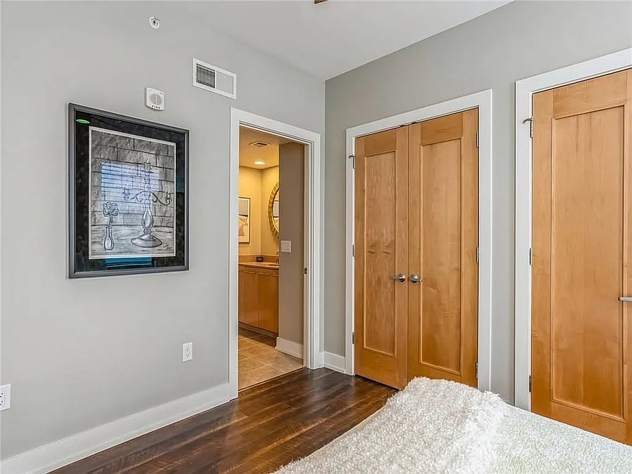 Closets in 2nd BR, door to ensuite bathroom