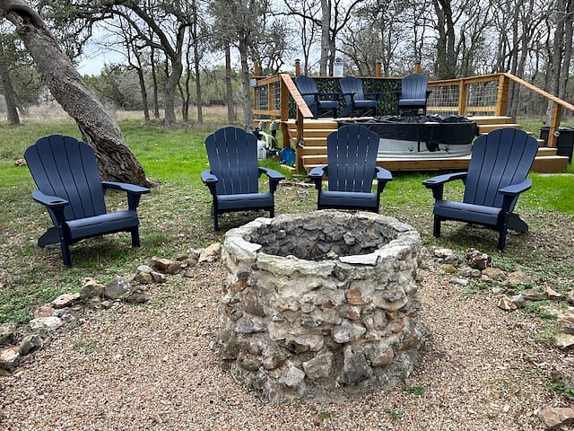 cool chairs w cup holders to sit around the fire pit