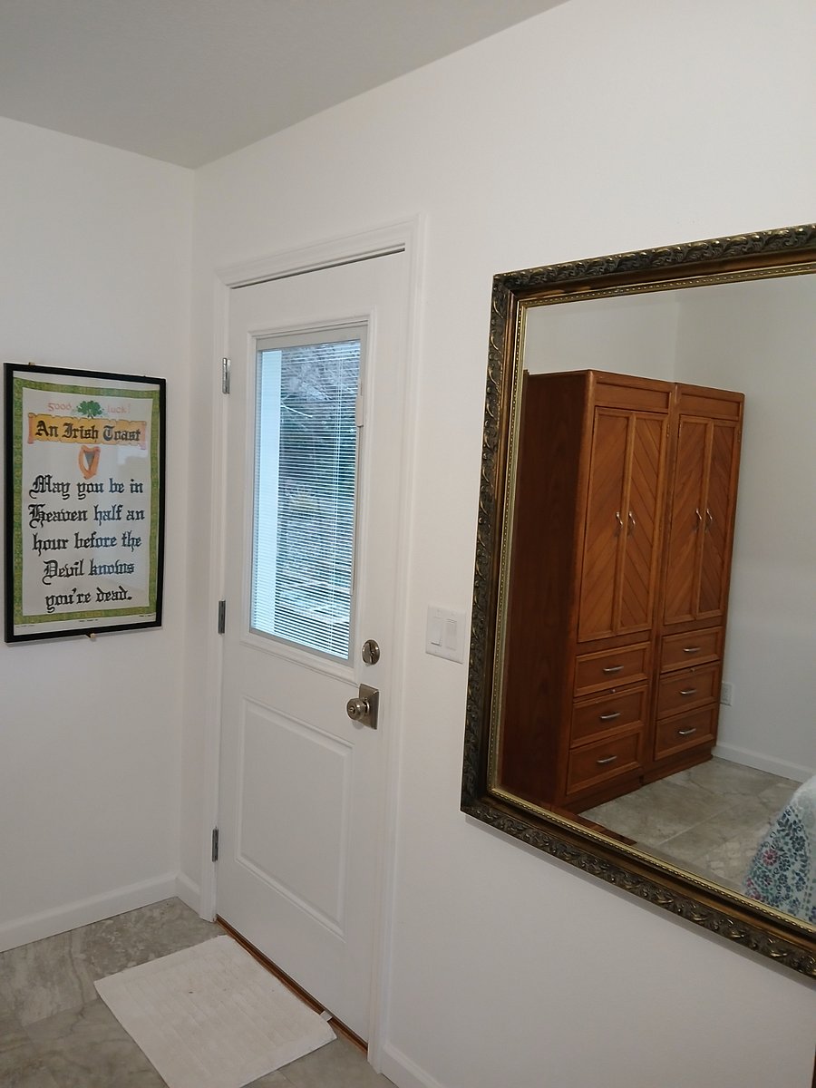 Backdoor off of bedroom.  