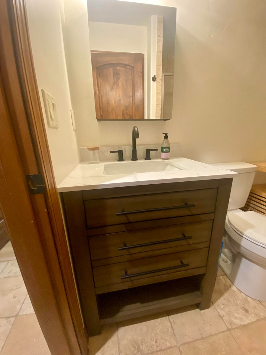 New bathroom vanity with plenty of storage.