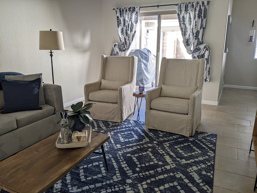 Living room has plenty of seating
