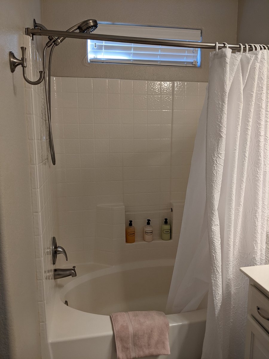 Main bedroom ensuite with shampoo, conditioner and body wash provided