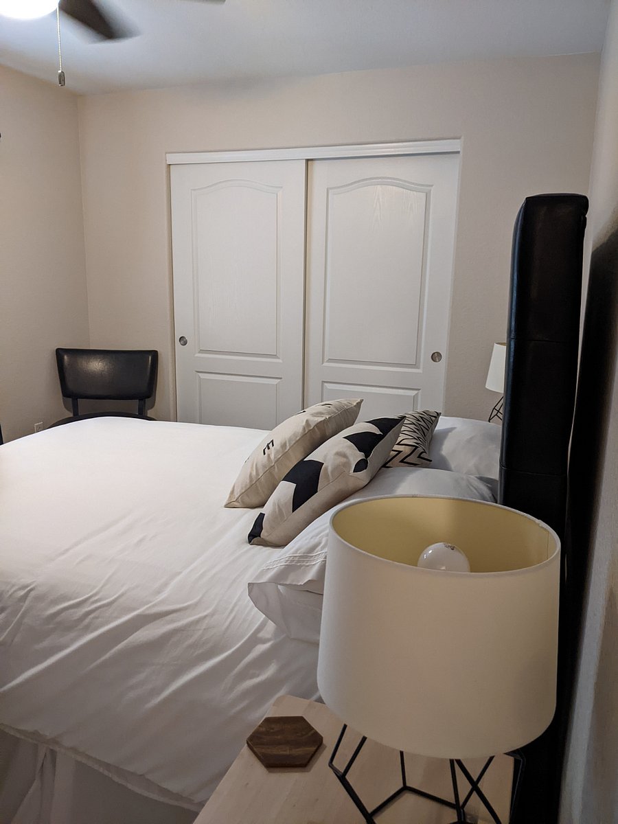 Upstairs north bedroom has a comfortable queen sized bed and a 32" Smart TV and dresser