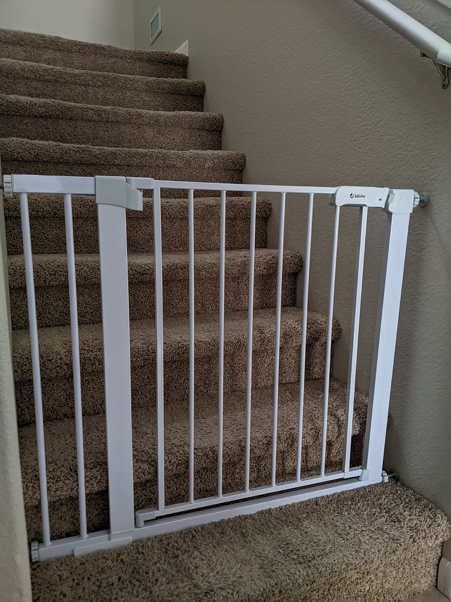 Baby gates at the top and bottom of the stairs for safety or for keeping pets downstairs