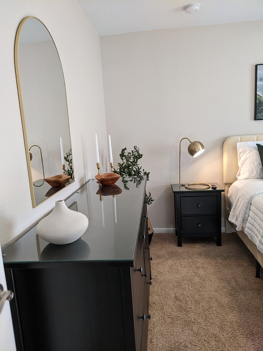 Upstairs south bedroom with comfy queen sized bed and 32" Smart TV
