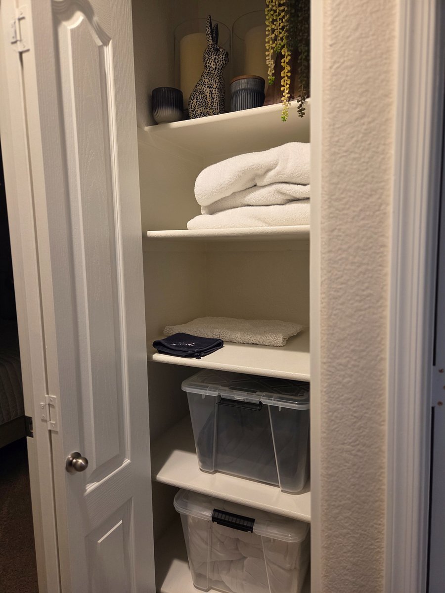 Upstairs hall closet with extra bath towels