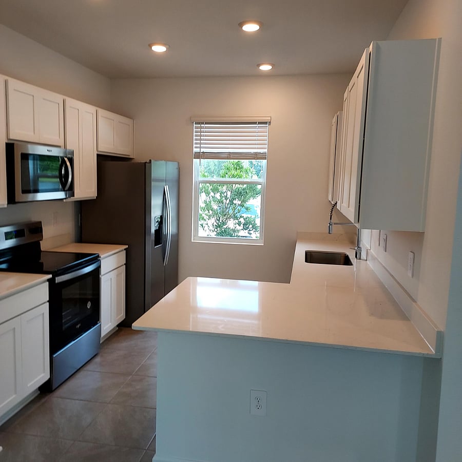 Modern kitchen with stainless steel appliances