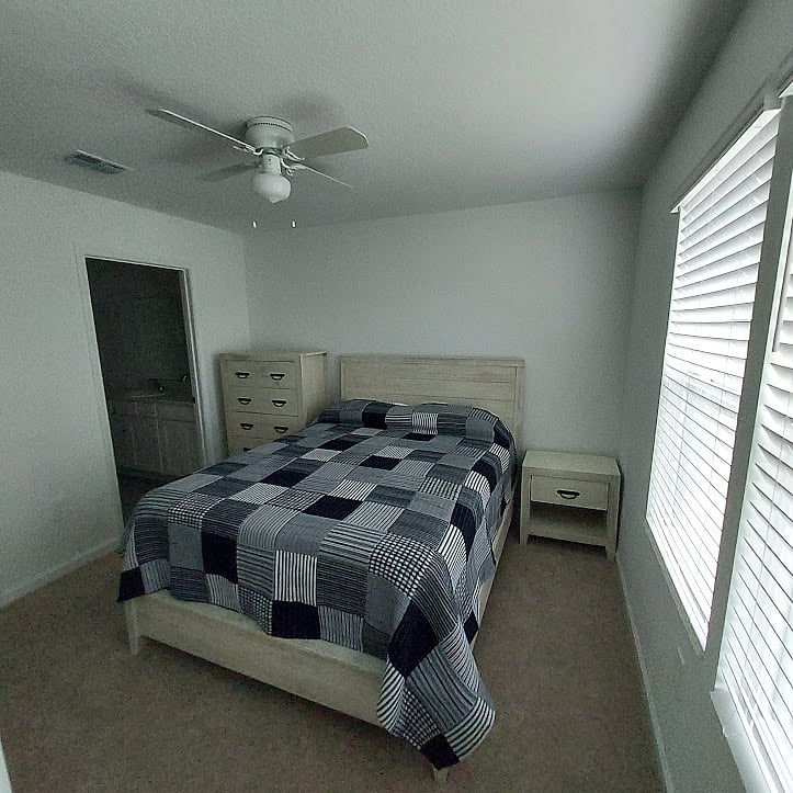 Master bedroom with queen bed