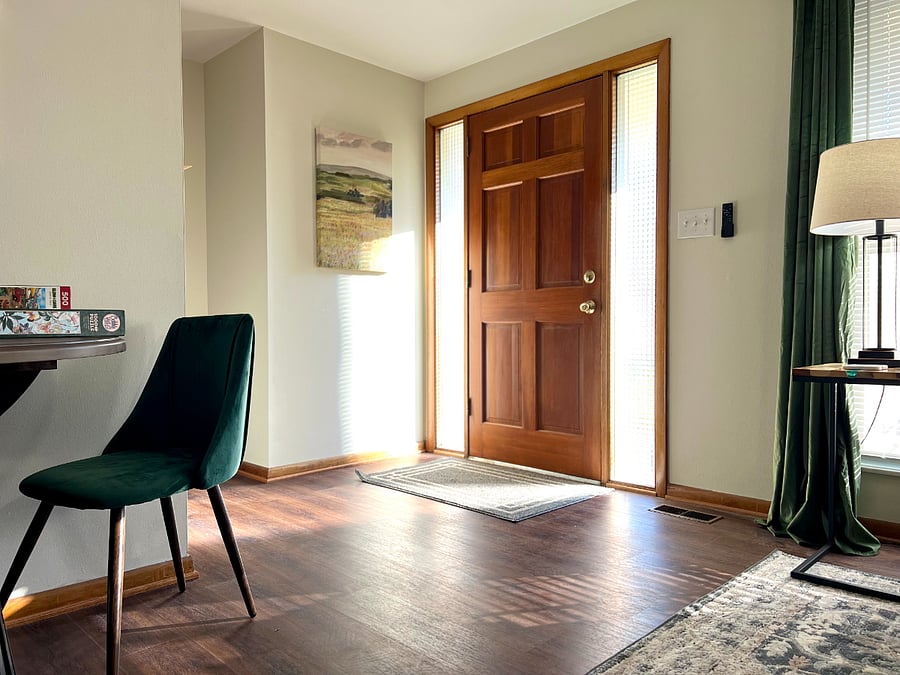 Great mid-century entry way with opaque glass side panels!