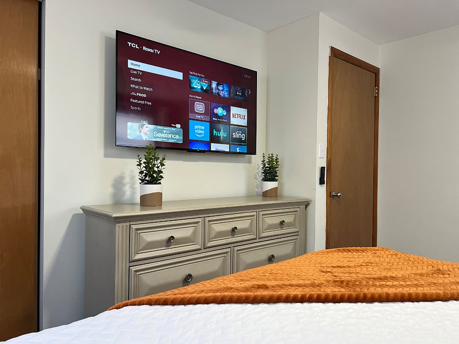 55" roku smart tv in primary en-suite.