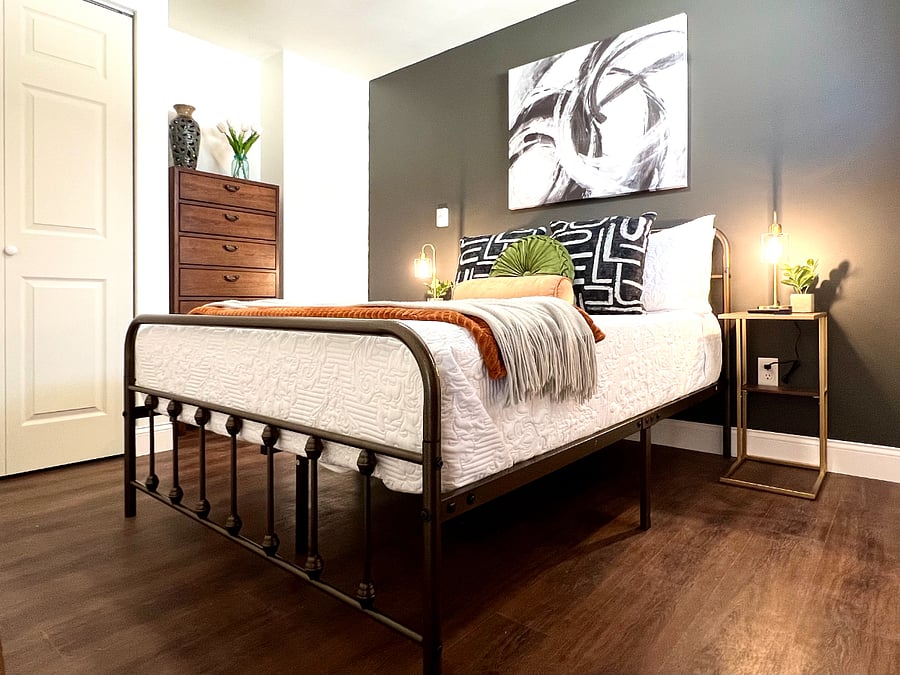 4th bedroom, full bed, on the other side of the home beyond the standing desk area. 