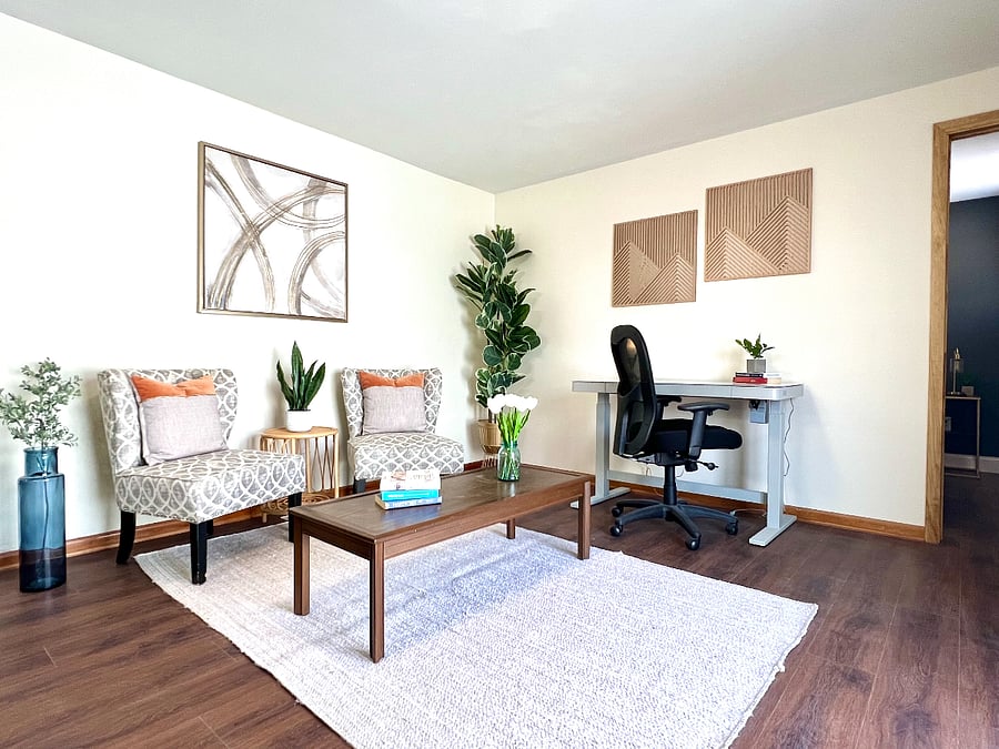 The reading nook and work space get lots of great natural light off of the double sliding doors which lead to the patio.