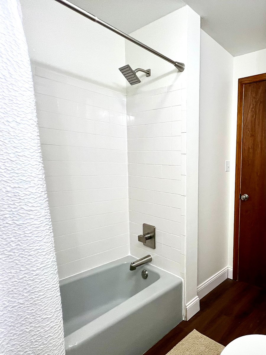 Full size tub, with nice tile surround! 