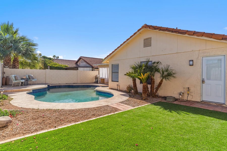 Pool with turf area.