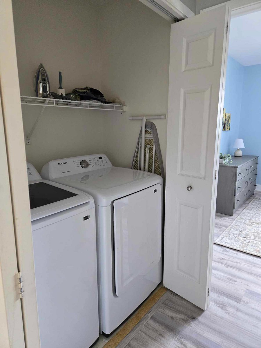 Upper level - New washer and dryer in the hallway.
