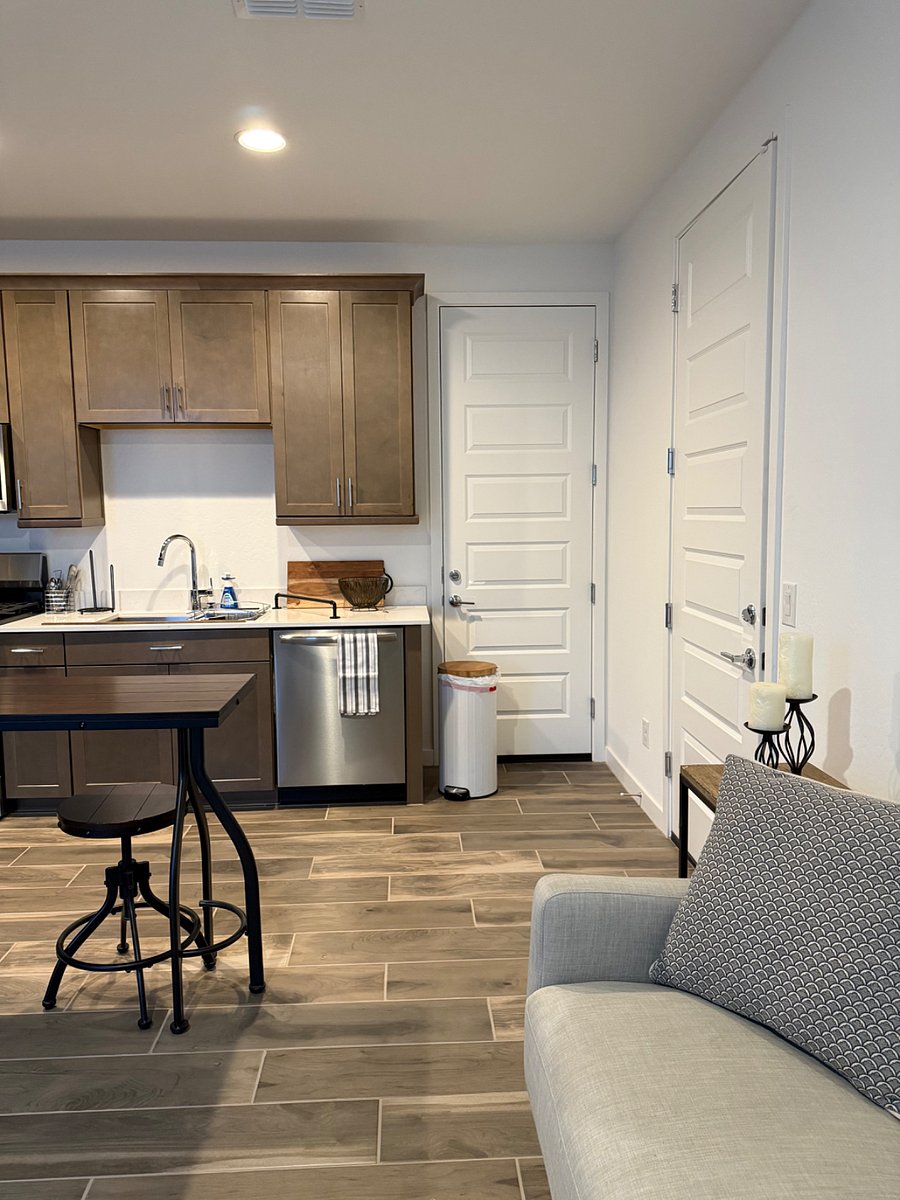Entrance from garage to right. The other door connects the unit to the main house. The door will remain locked. That door is also treated as an exterior door along with the door to the garage and the front door for the alarm system.