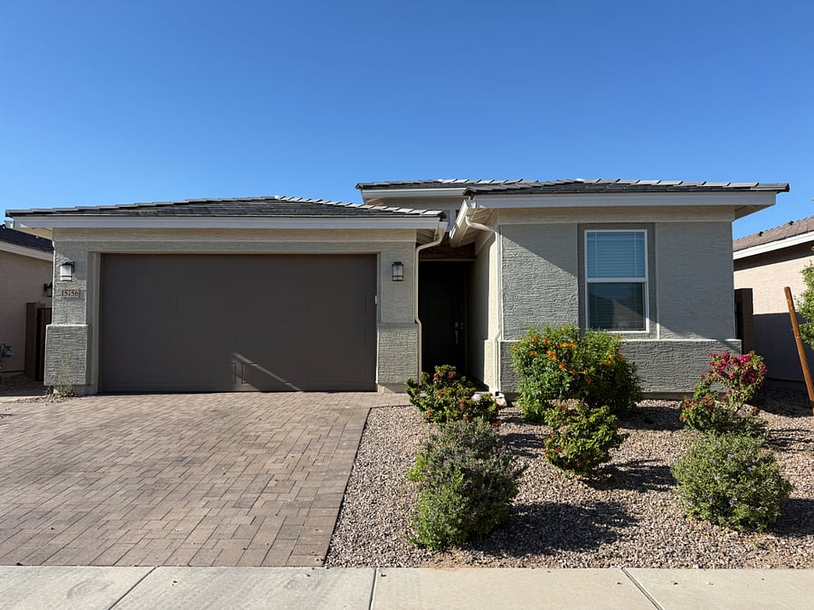 Your entrance is the sidewalk to the left of the garage through the gate.