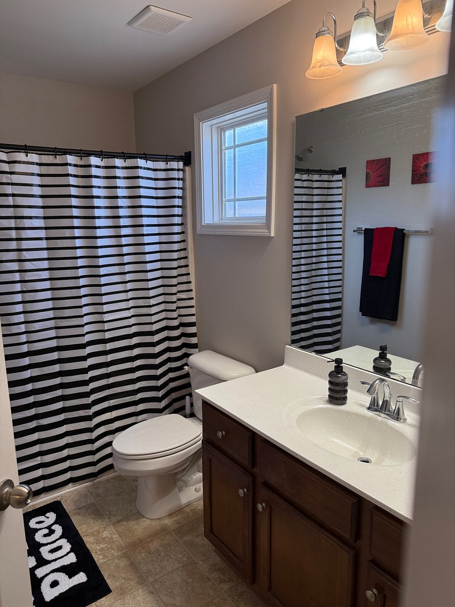 Secondary bath also has a tub