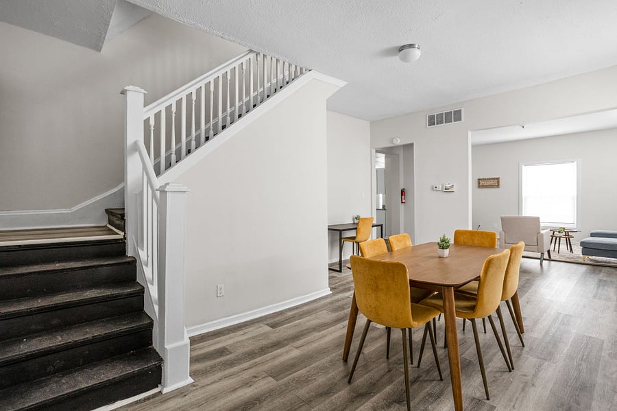 Modern dining area with stylish seating and an inviting open layout.