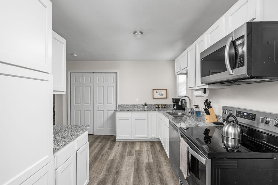 Spacious and stylish kitchen featuring modern appliances and elegant countertops.